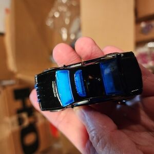 Black and Blue Diecast Model Car